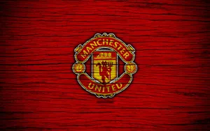 Manchester United Team And Wooden Background Wallpaper