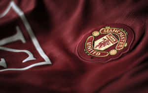 Manchester United Team Logo On Shirt Wallpaper