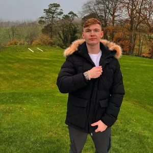 Manin Black Jacket Outdoors.jpg Wallpaper