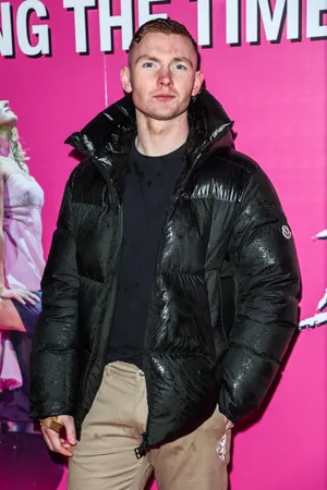 Manin Black Puffer Jacketat Event Wallpaper