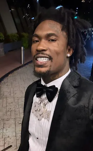 Manin Black Suitand Bow Tie Wallpaper