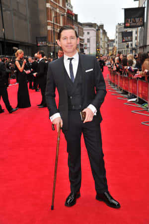 Manin Black Suiton Red Carpet Wallpaper