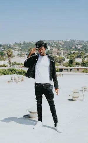 Manin Casual Urban Wearon Rooftop Wallpaper