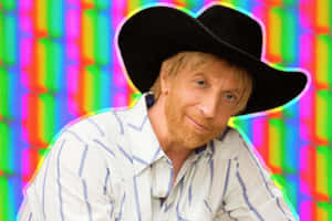 Manin Cowboy Hatwith Colorful Background.jpg Wallpaper