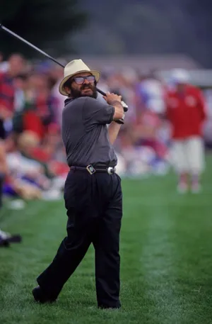 Manin Hat Golfing Wallpaper