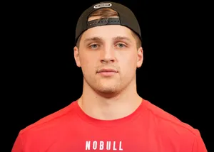 Manin Red Shirtand Cap Wallpaper