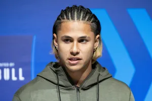 Manwith Braided Hairstyleat Event Wallpaper