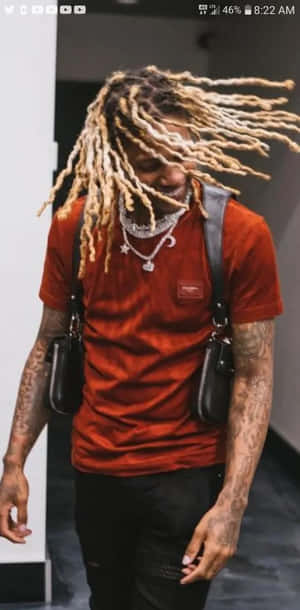 Manwith Dreadlocksand Red Shirt Wallpaper