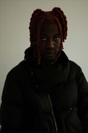 Manwith Red Dreadlocksin Black Jacket Wallpaper