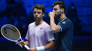 Marcel Granollers Talking To Horacio Zeballos Wallpaper