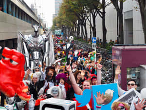 Marchers Celebrate During A Halloween Parade Wallpaper