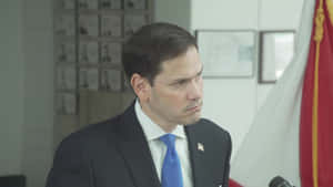 Marco Rubio Listening Fervently Wallpaper