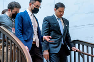 Marco Rubio Walking Down The Stairs Wallpaper