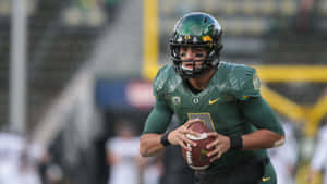 Marcus Mariota Oregon Ducks Quarterback Action Wallpaper