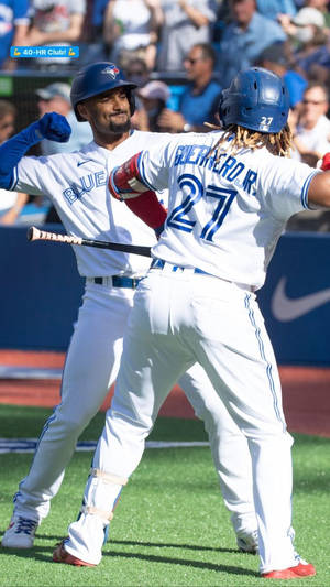 Marcus Semien Fist Bump With Guerrero Wallpaper