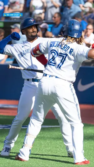 Marcus Semien Fist Bump With Guerrero Wallpaper