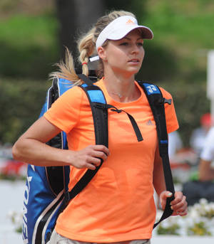 Maria Kirilenko Holding A Blue Tennis Bag Wallpaper