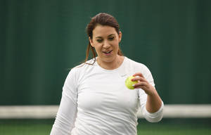 Marion Bartoli Holding Tennis Ball Wallpaper