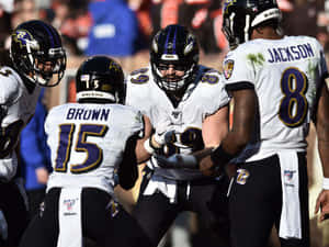 Mark Andrews Nfl Teammates Celebrating Wallpaper