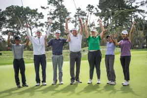 Mark O'meara Strikes Up A Pose With His Bag Of Golf Clubs Wallpaper