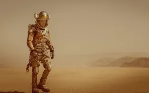 Mark Watney Explores The Martian Landscape In His Rover Wallpaper