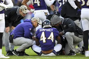 Marlon Humphrey Injury Assistanceon Field Wallpaper