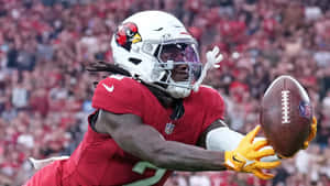 Marquise Brown Catching Football During Game Wallpaper