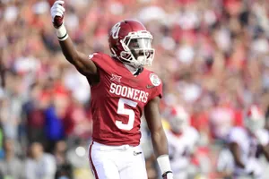 Marquise Brown Oklahoma Sooners Celebration Wallpaper