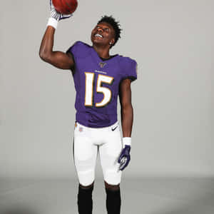 Marquise Brown Ravens Uniform Catch Pose Wallpaper
