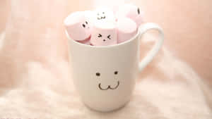 Marshmallows In A Cup With Faces On Them Wallpaper