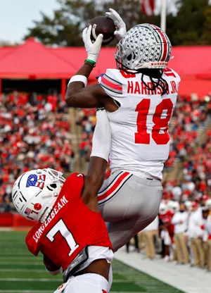 Marvin Harrison Jr Catching Football Wallpaper