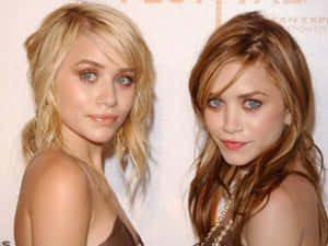 Mary Kate Olsen Exudes Elegance At A Celebrity Event Wallpaper