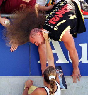 Mary Pierce Signing An Autograph For A Fan Wallpaper