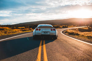 Maserati Car At Sunset Wallpaper