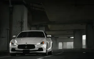 Maserati Ghibli Cruising In The Night City Wallpaper