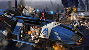 Mass Effect 2 - Commander Shepard And Team In Action Wallpaper