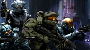 Master Chief And Blue Team In Action Wallpaper