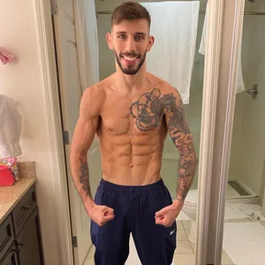 Matheus Nicolau Showing Off Muscles Wallpaper