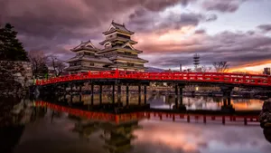 Matsumoto Castle On Cloudy Day During Sunset Wallpaper