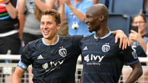 Matt Besler And Ike Opara Of Sporting Kansas City Wallpaper