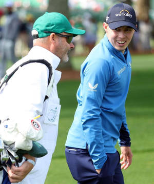 Matt Fitzpatrick And His Caddie, Billy Foster On The Golf Course Wallpaper