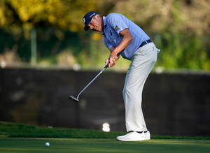 Matt Kuchar Preparing To Hit Ball Wallpaper