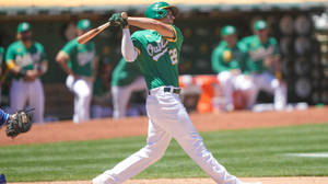 Matt Olson Rocking In His Green Uniform Wallpaper