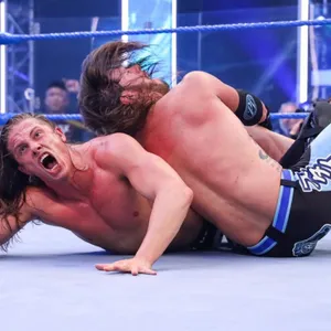 Matt Riddle Versus A.j. Styles Wallpaper