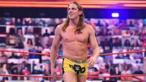 Matt Riddle Wearing Yellow Wrestling Shorts Wallpaper