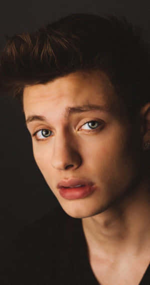 Matt Rife, Comedian, And Tv Personality Posing In A Stylish Outfit Wallpaper