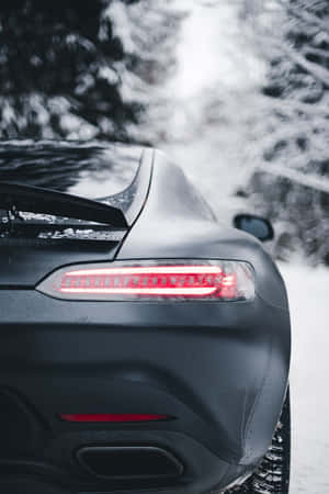 Matte Black Car Winter Drive Wallpaper