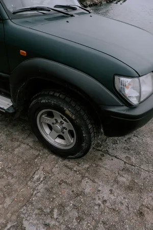 Matte Black S U V Closeup Wallpaper