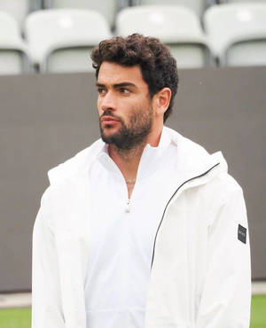 Matteo Berrettini In White Jacket Wallpaper