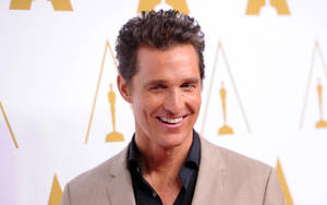 Matthew Mcconaughey In Hugo Boss Suit Wallpaper